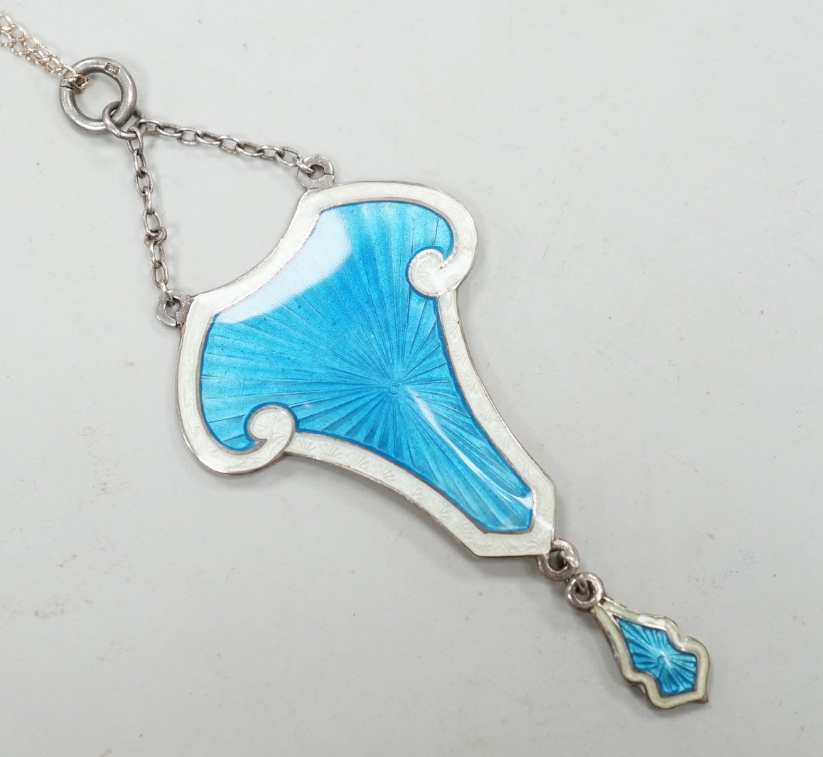 An Edwardian Art Nouveau silver and two colour enamel drop pendant necklace, J. Aitken & Son, Birmingham, 58cm.